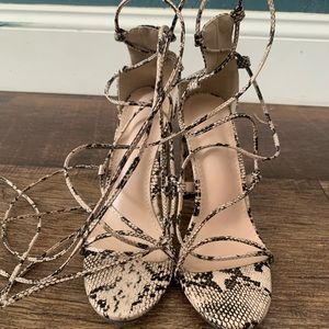 Strappy snake skin heels